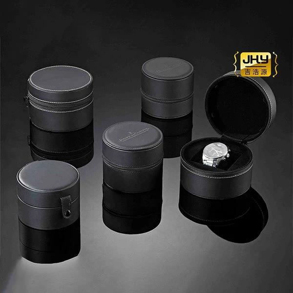 Schwarze zylindrische Uhr Organisator